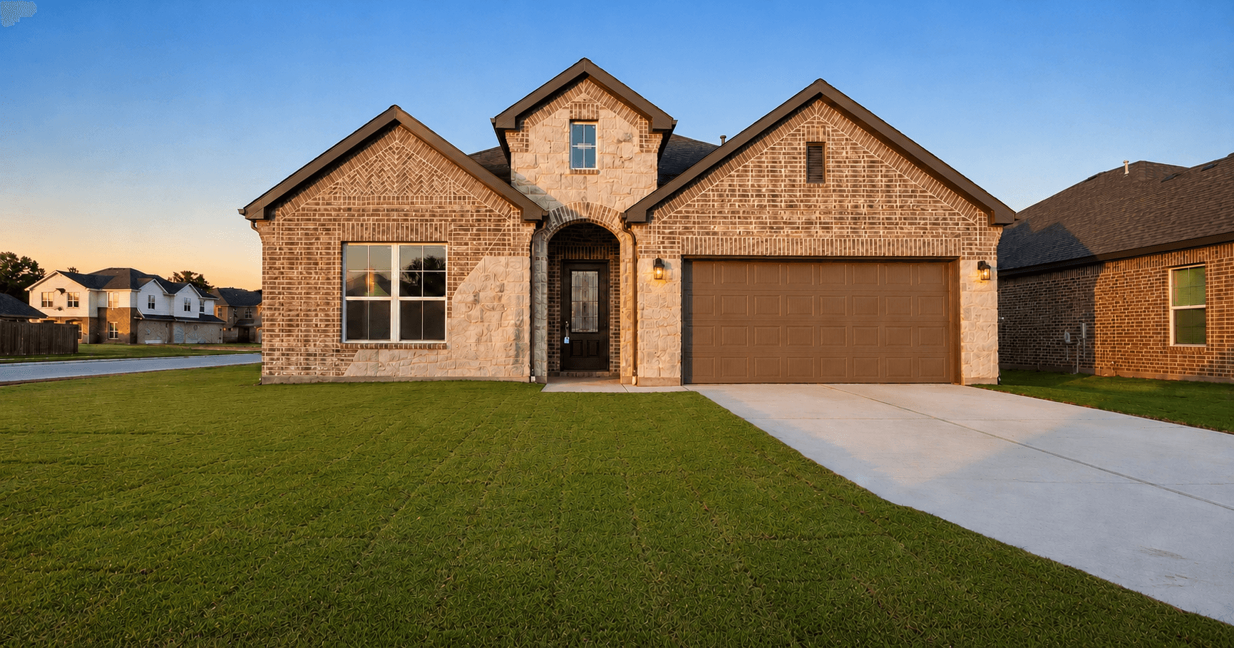 Move-in ready new construction home in Magnolia Texas at dusk